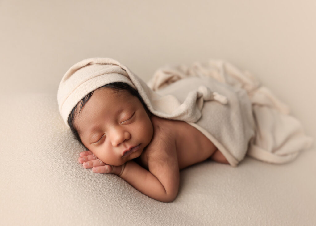 Relaxed newborn posing