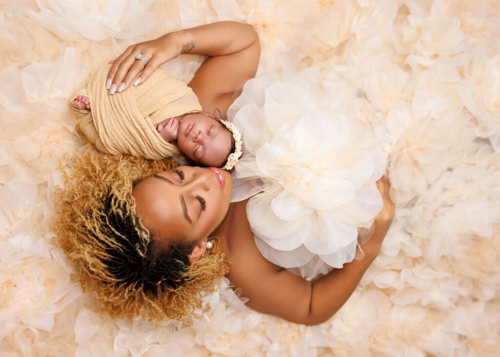 mom and baby professional photo laying down